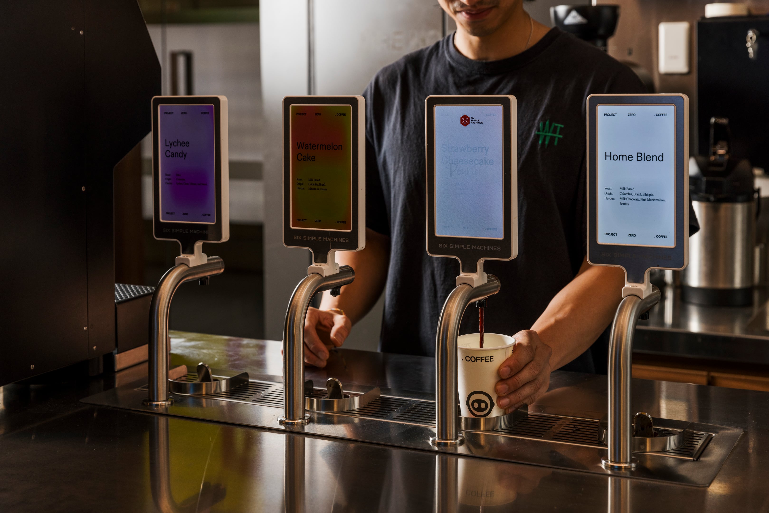 A barista dispenses one of four pre-made espresso choices at Project Zero Flinders Lane, Melbourne. Photo: Amy Hemmings.
